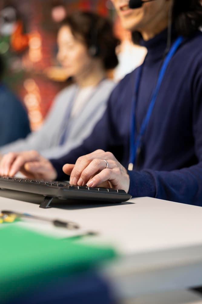 Close up of BPO Service operator assisting customers with issues